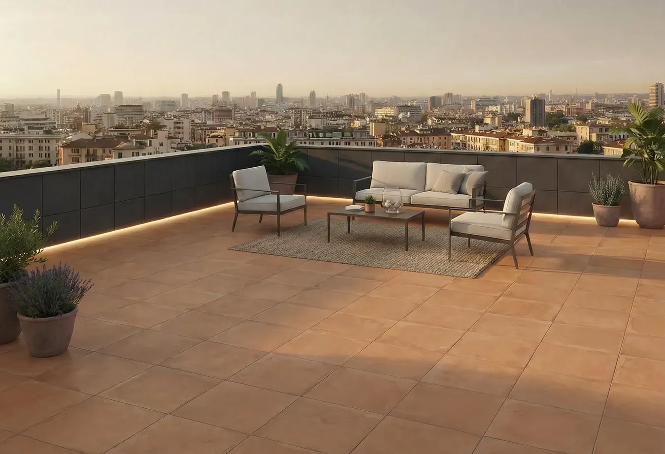 Terracotta look porcelain pavers on urban rooftop terrace with modern lounge furniture and city skyline
